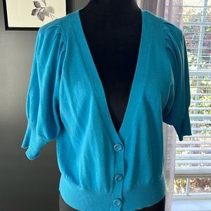 Aqua colored short sleeved shrug. Petite large